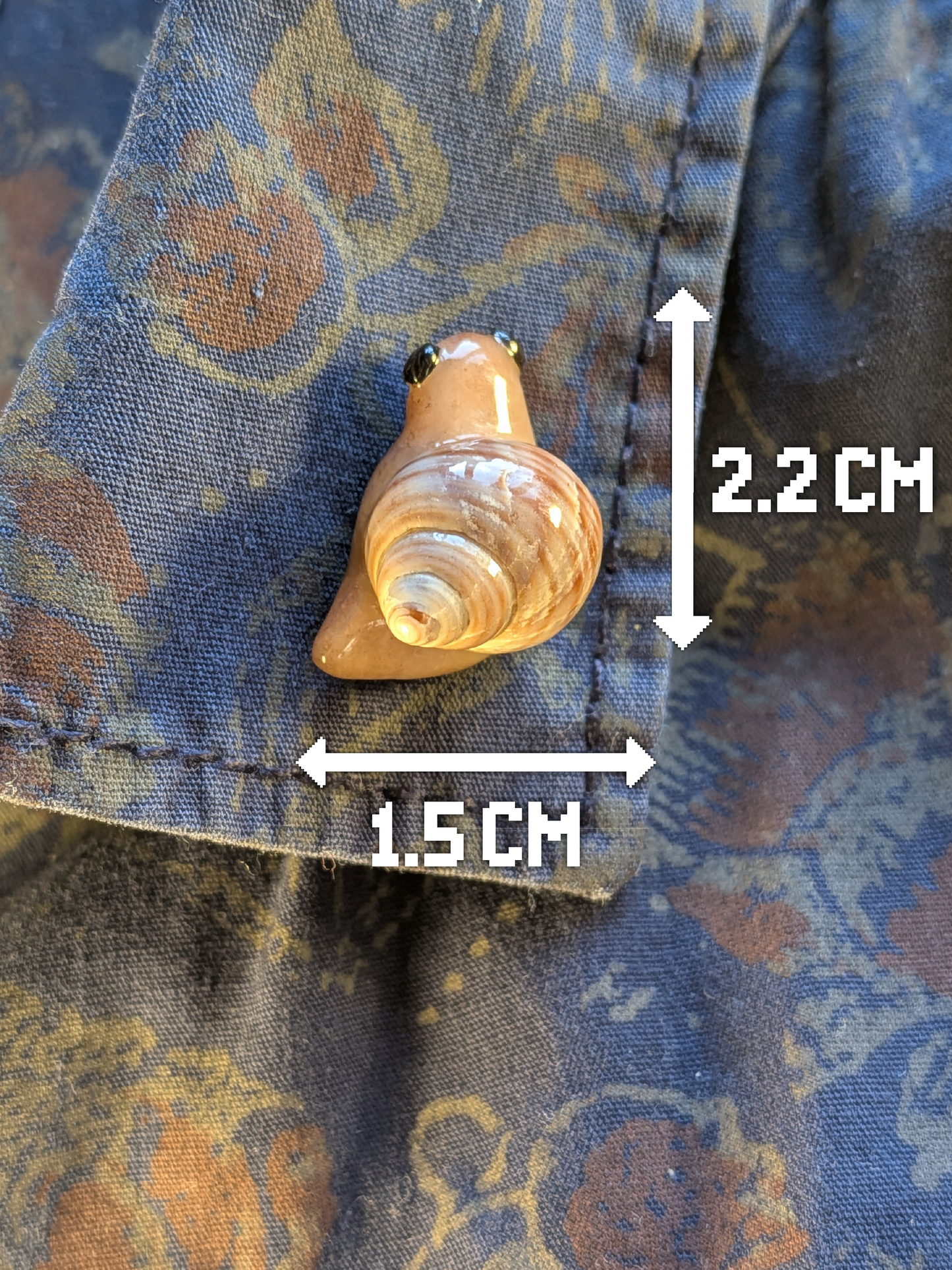 Snail pin badge